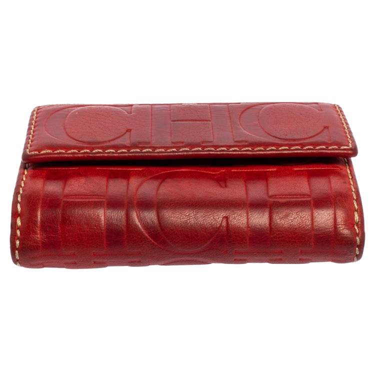 مملوكة مسبقًا Carolina Herrera Monogram Embossed Leather Compact Wallet