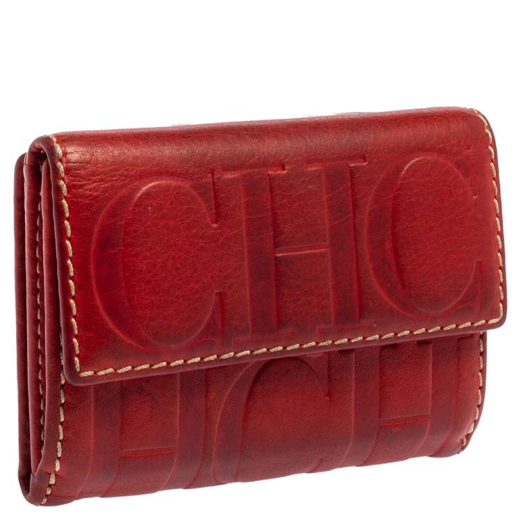مملوكة مسبقًا Carolina Herrera Monogram Embossed Leather Compact Wallet
