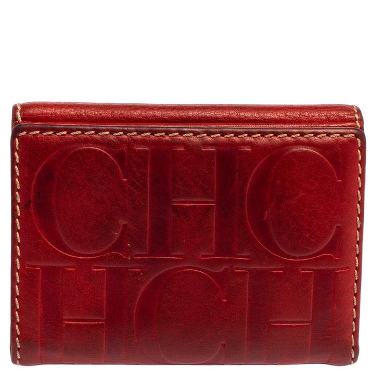 مملوكة مسبقًا Carolina Herrera Monogram Embossed Leather Compact Wallet