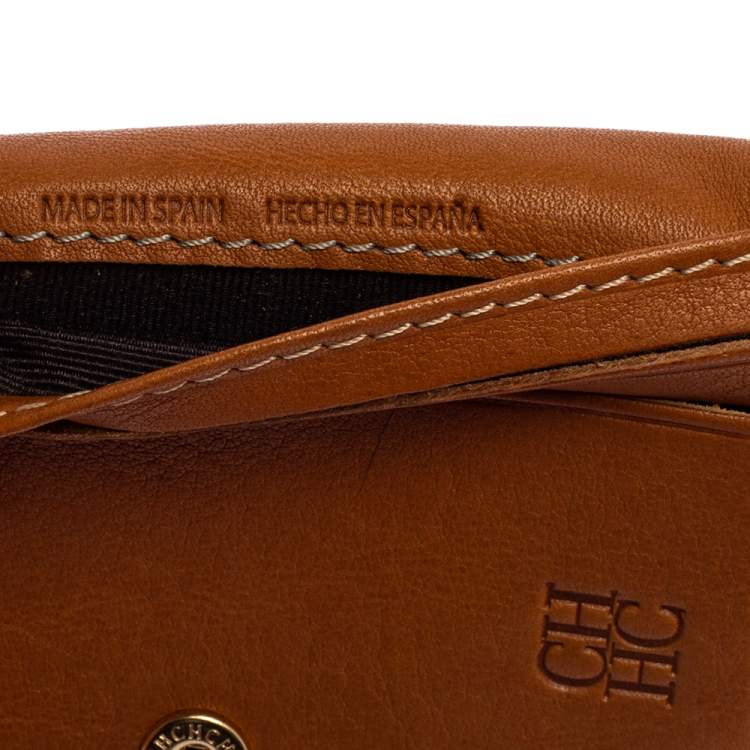 مملوكة مسبقًا Carolina Herrera Monogram Embossed Leather Compact Wallet