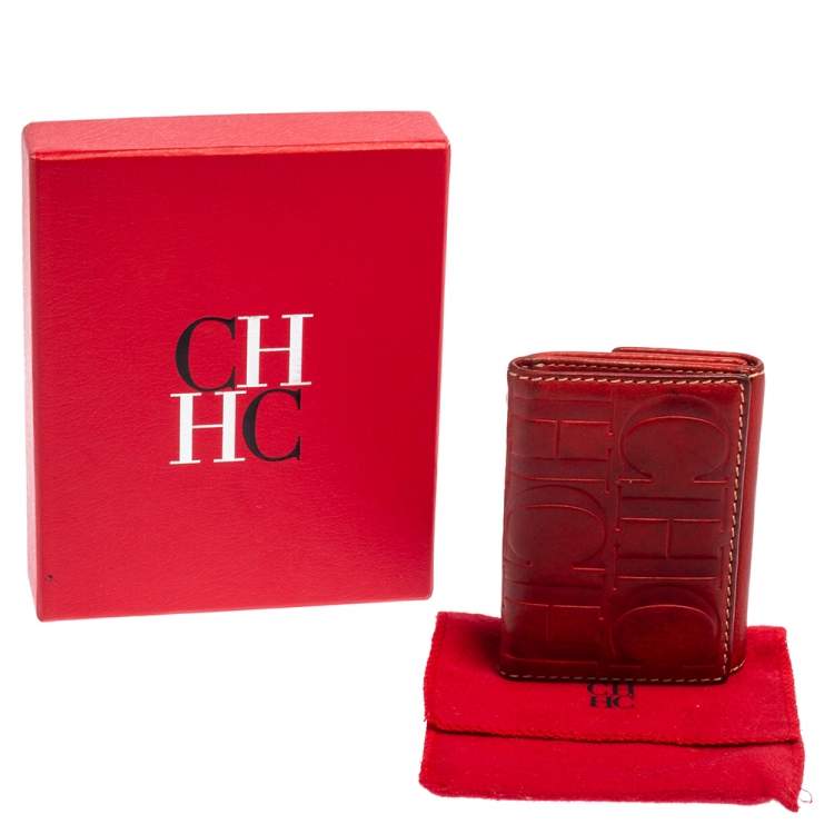 مملوكة مسبقًا Carolina Herrera Monogram Embossed Leather Compact Wallet