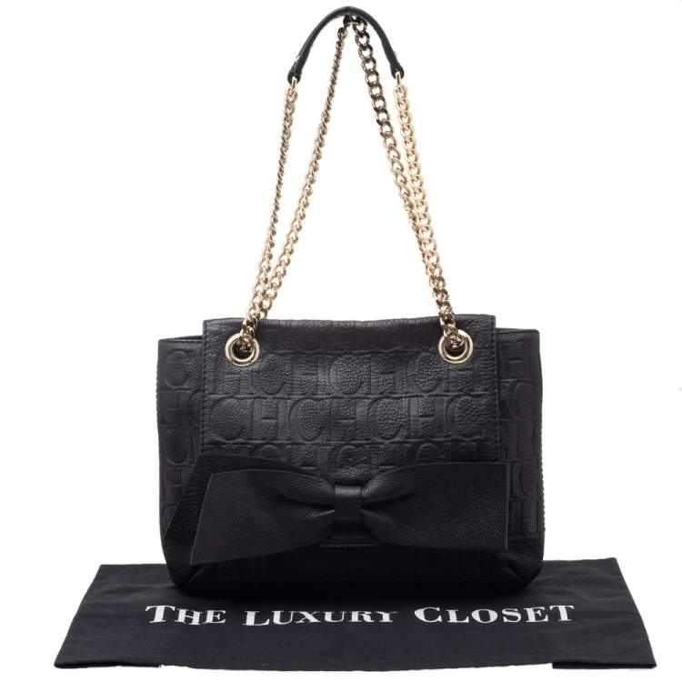 Pre Owned Carolina Herrera Black Monogram Embossed Leather Bow Flap Shoulder Bag