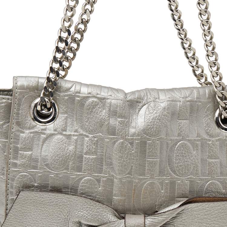 Pre Owned Carolina Herrera Silver Monogram Embossed Leather Bow Flap Shoulder Bag