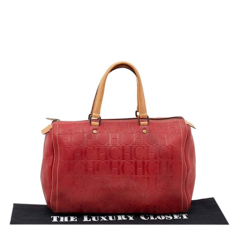 Pre Owned Carolina Herrera Red Monogram Embossed Leather Large Andy Boston Bag