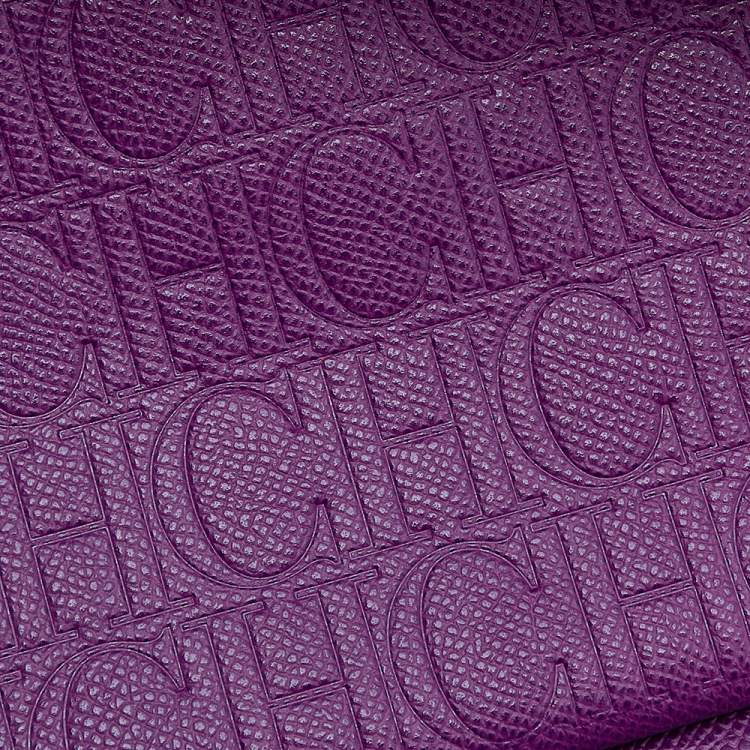 Pre Owned Carolina Herrera Purple Monogram Embossed Leather Minuetto Top Handle Bag