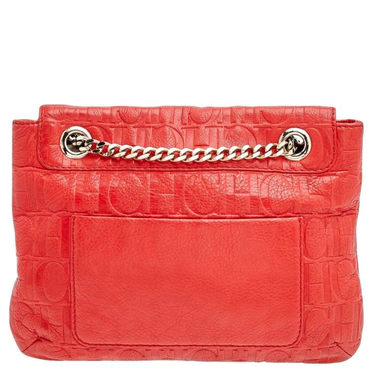 Pre Owned Carolina Herrera Orange Monogram Embossed Leather Bow Flap Shoulder Bag