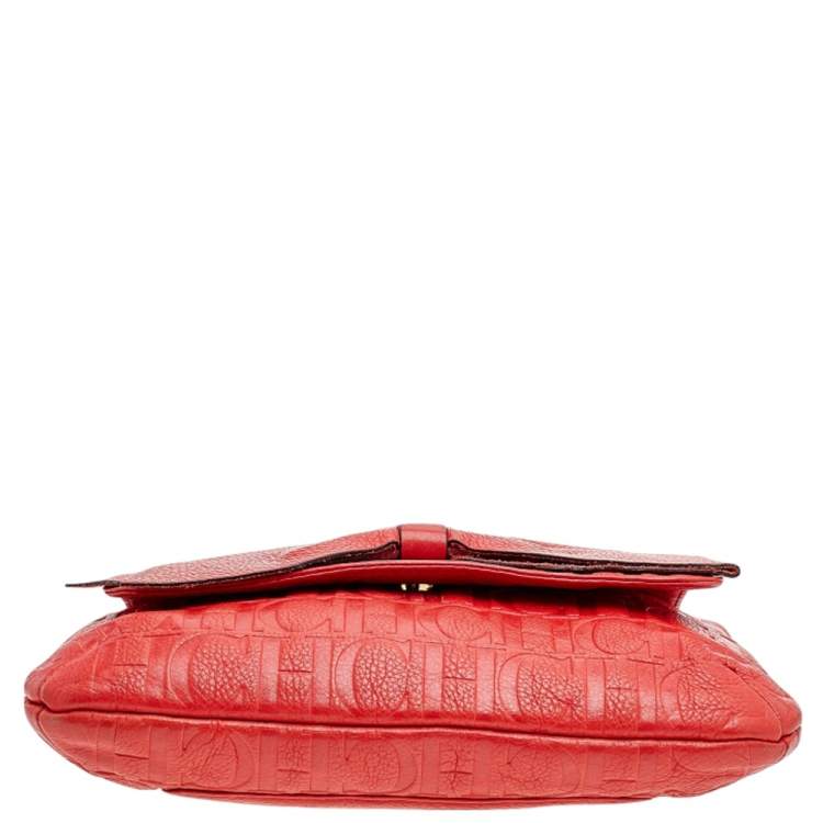 Pre Owned Carolina Herrera Orange Monogram Embossed Leather Bow Flap Shoulder Bag