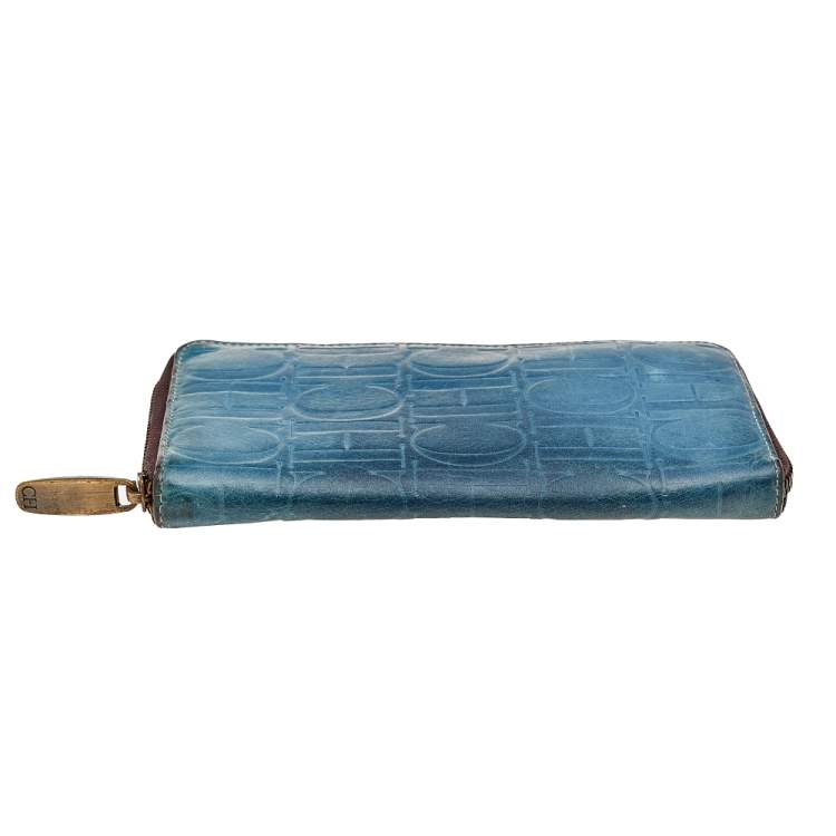 Pre Owned Carolina Herrera Blue Monogram Embossed Leather Zip Around Wallet