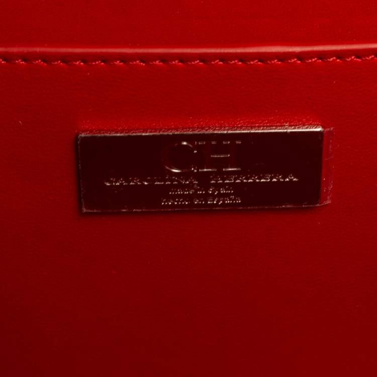 Pre Owned Carolina Herrera Black Logo Embossed Leather Insignia Top Handle Bag