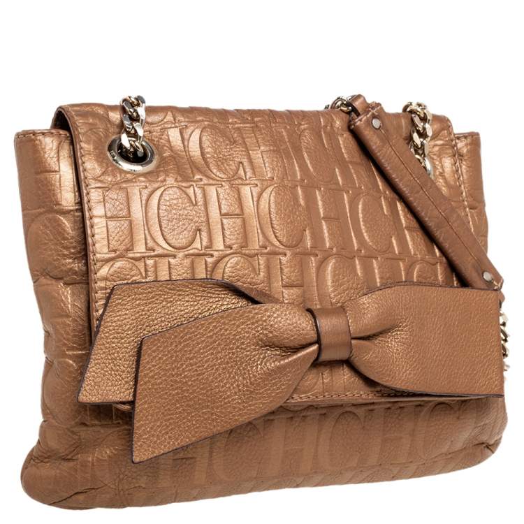 Pre Owned Carolina Herrera Metallic Gold Monogram Embossed Leather Bow Flap Shoulder Bag