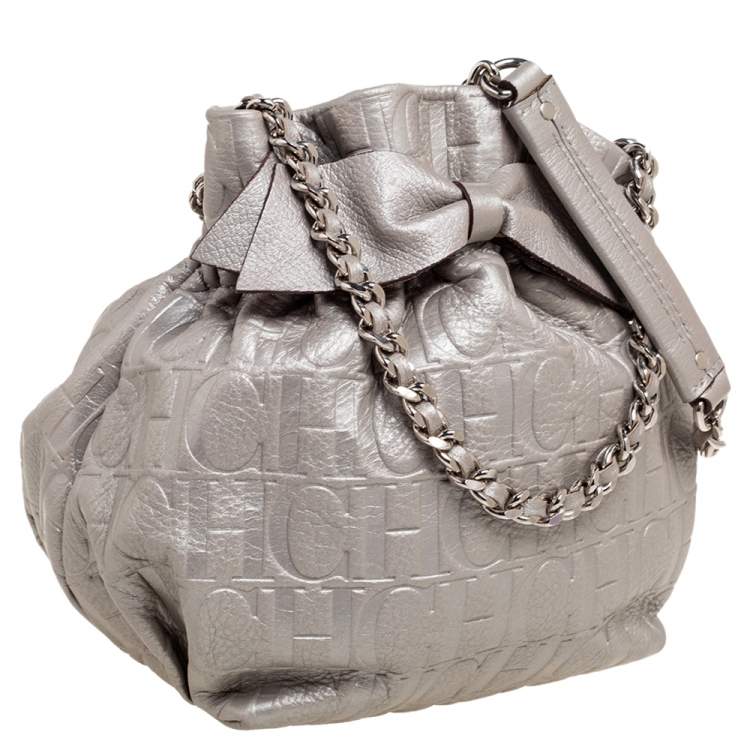 Pre Owned Carolina Herrera Metallic Silver Embossed Leather Bow Bucket Bag