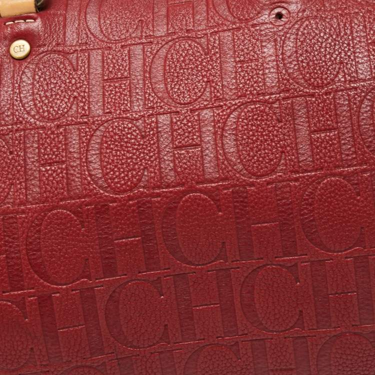 Pre Owned Carolina Herrera Red Monogram Embossed Leather Large Andy Boston Bag