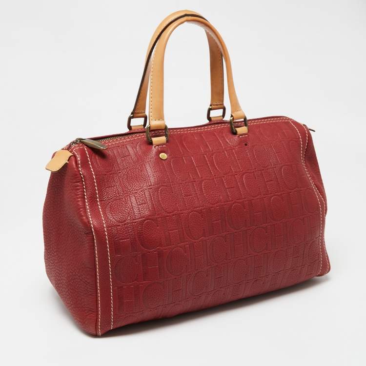 Pre Owned Carolina Herrera Red Monogram Embossed Leather Large Andy Boston Bag