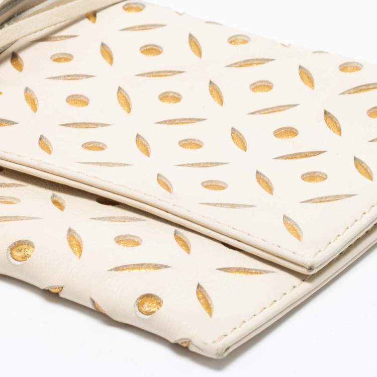 Pre Owned Carolina Herrera Off White/Gold Laser Cut Leather Tassel Clutch