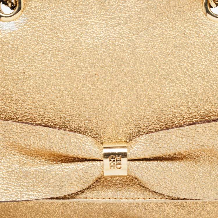 Pre Owned Carolina Herrera Gold Monogram Embossed Leather Bow Flap Shoulder Bag