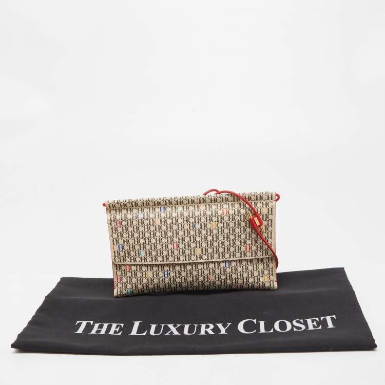 Pre Owned Carolina Herrera Red/Beige Monogram Coated Canvas and Leather Traveler Shoulder Bag