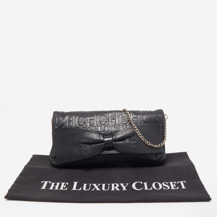 Pre Owned Carolina Herrera Black Monogram Embossed Leather Bow Chain Clutch