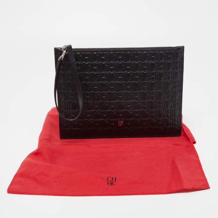 Pre Owned Carolina Herrera Black Monogram Embossed Leather Zip Wristlet Pouch 
