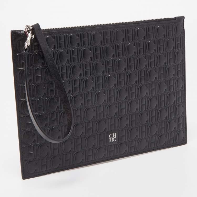 Pre Owned Carolina Herrera Black Monogram Embossed Leather Zip Wristlet Pouch 