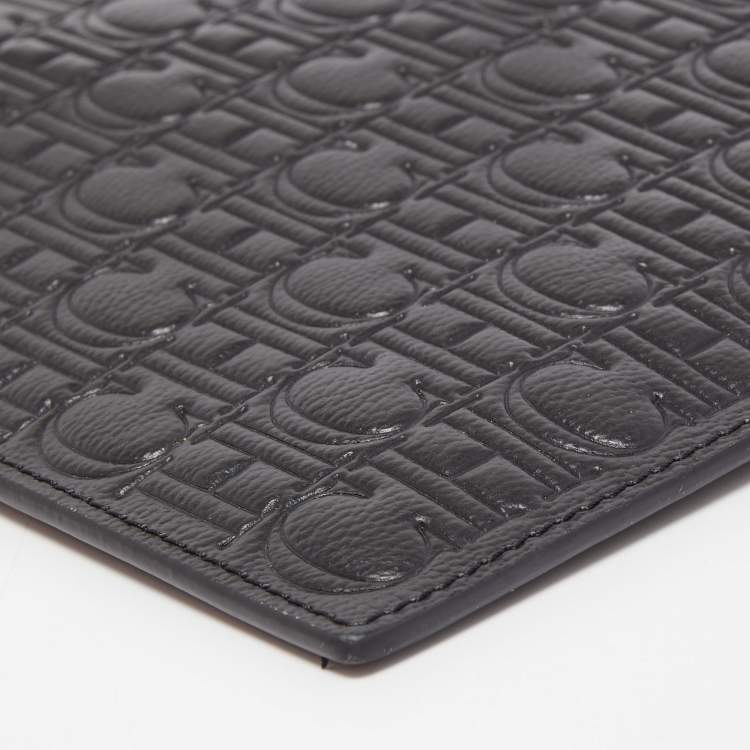 Pre Owned Carolina Herrera Black Monogram Embossed Leather Zip Wristlet Pouch 