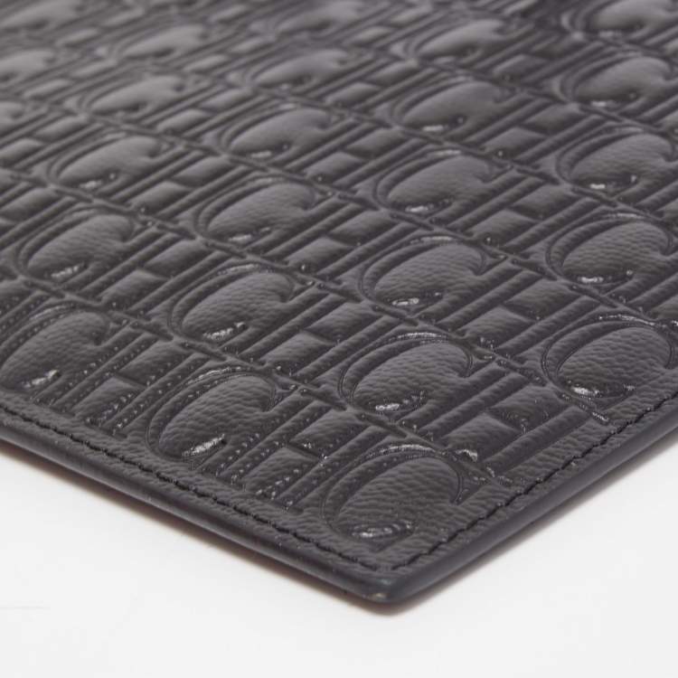 Pre Owned Carolina Herrera Black Monogram Embossed Leather Zip Wristlet Pouch 