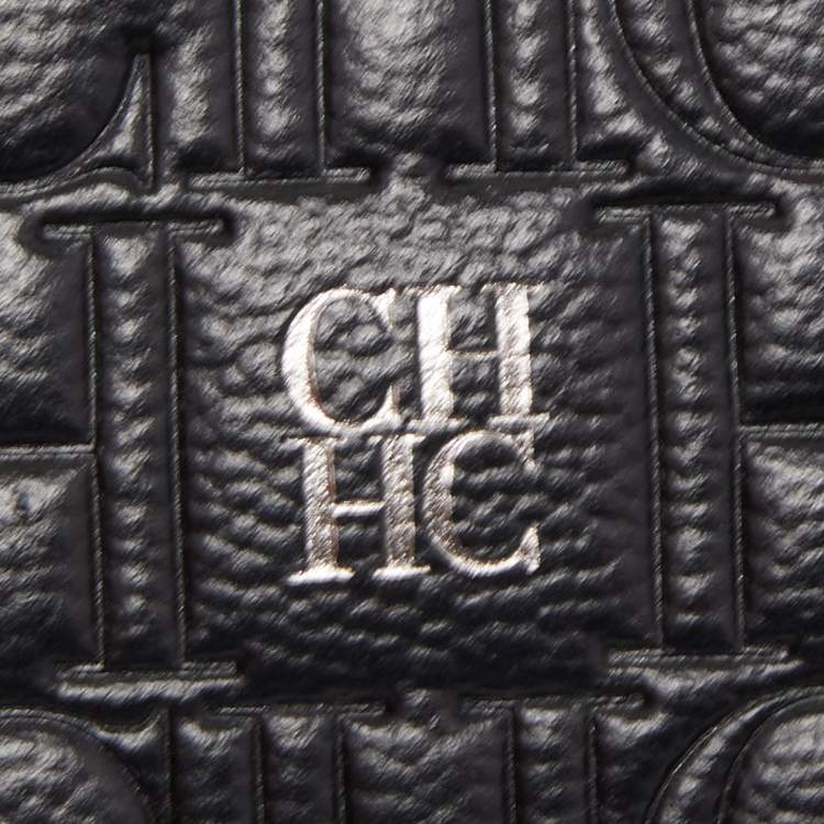 Pre Owned Carolina Herrera Black Monogram Embossed Leather Zip Wristlet Pouch 