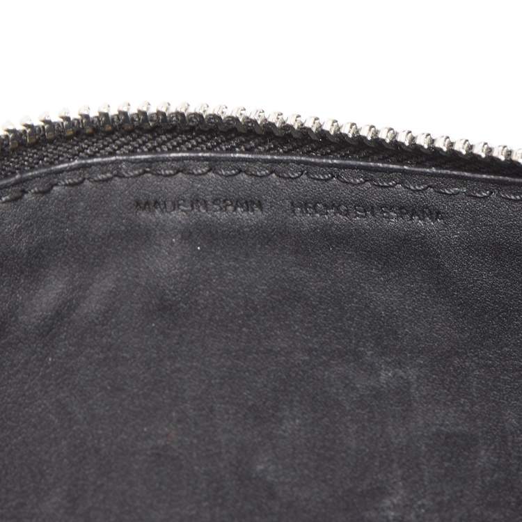 Pre Owned Carolina Herrera Black Monogram Embossed Leather Zip Wristlet Pouch 