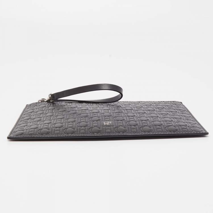 Pre Owned Carolina Herrera Black Monogram Embossed Leather Zip Wristlet Pouch 