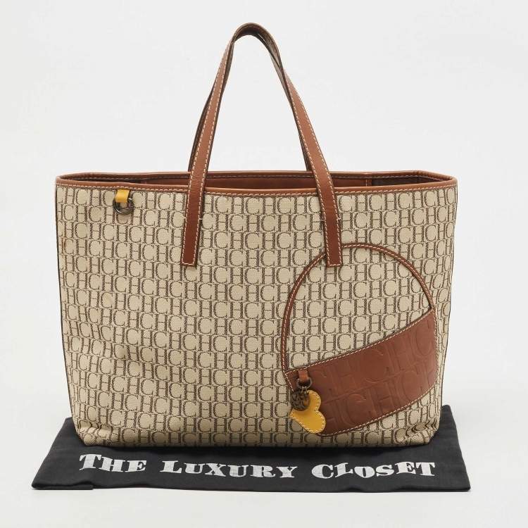 Pre Owned Carolina Herrera Brown/Beige Monogram Canvas and Leather Patchwork Tote