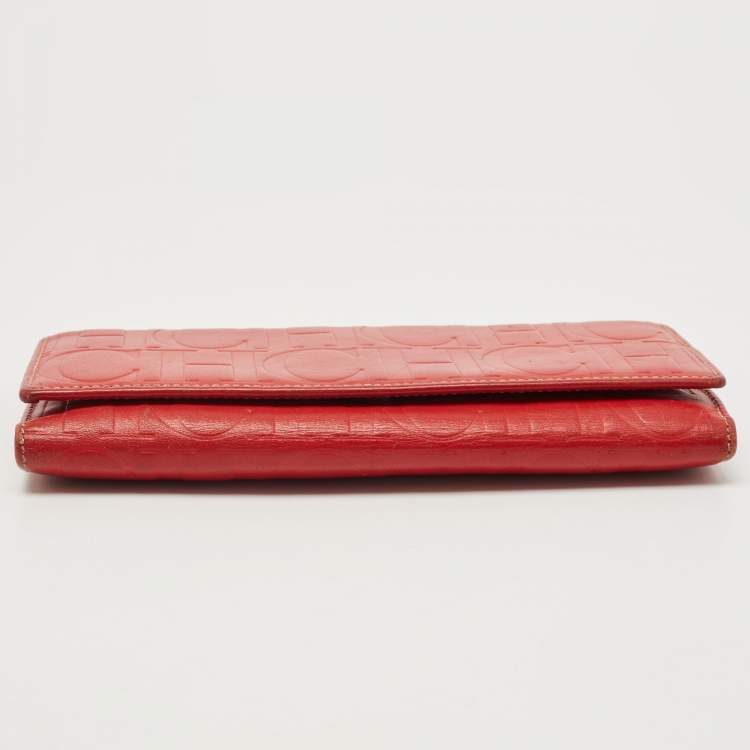 Pre Owned Carolina Herrera Red Monogram Embossed Leather Flap Continental Wallet