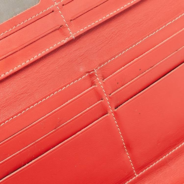 Pre Owned Carolina Herrera Red Monogram Embossed Leather Flap Continental Wallet