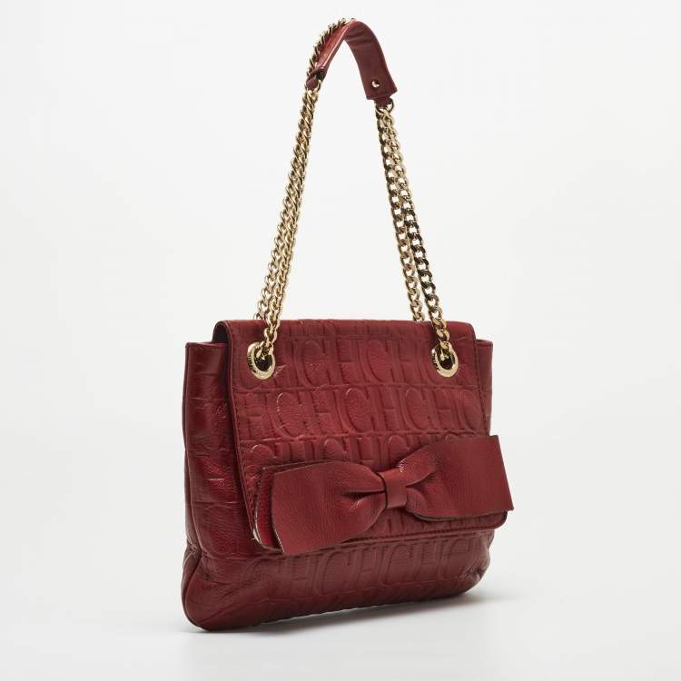 مملوكة مسبقًا Carolina Herrera Red Monogram Embossed Leather Bow Shoulder Bag