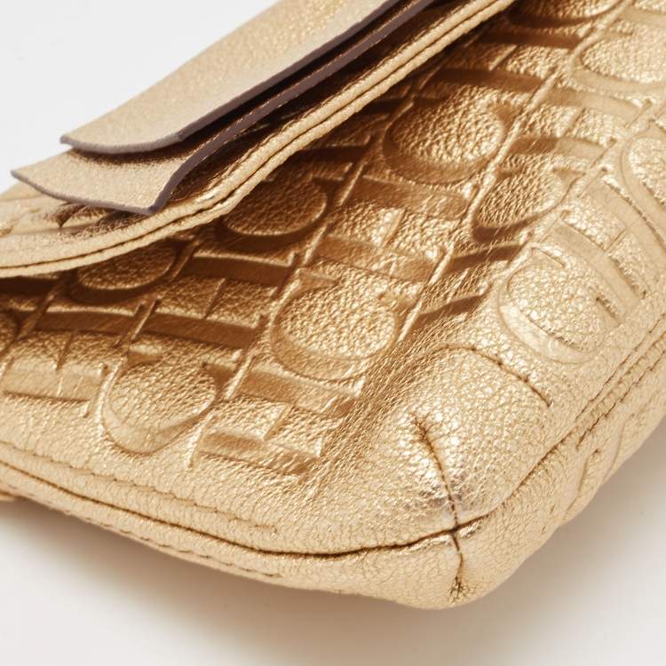 Pre Owned Carolina Herrera Gold Monogram Embossed Leather Bow Flap Clutch
