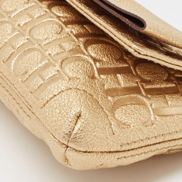 Pre Owned Carolina Herrera Gold Monogram Embossed Leather Bow Flap Clutch