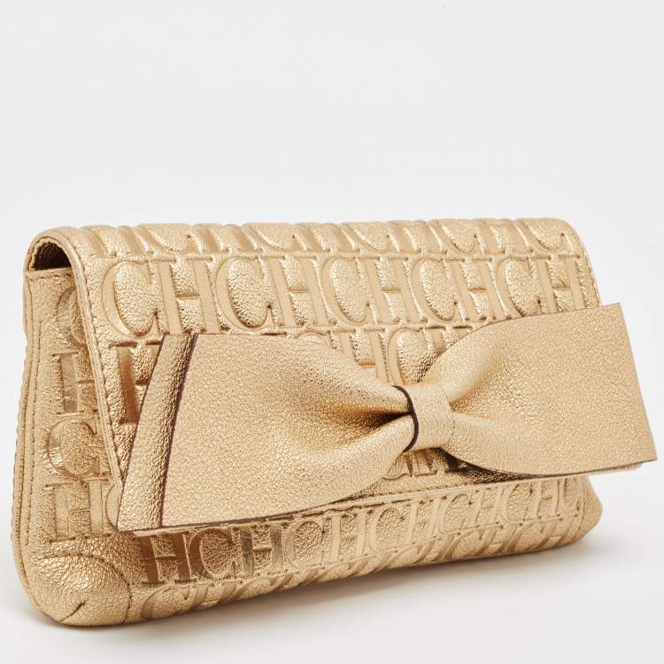 Pre Owned Carolina Herrera Gold Monogram Embossed Leather Bow Flap Clutch