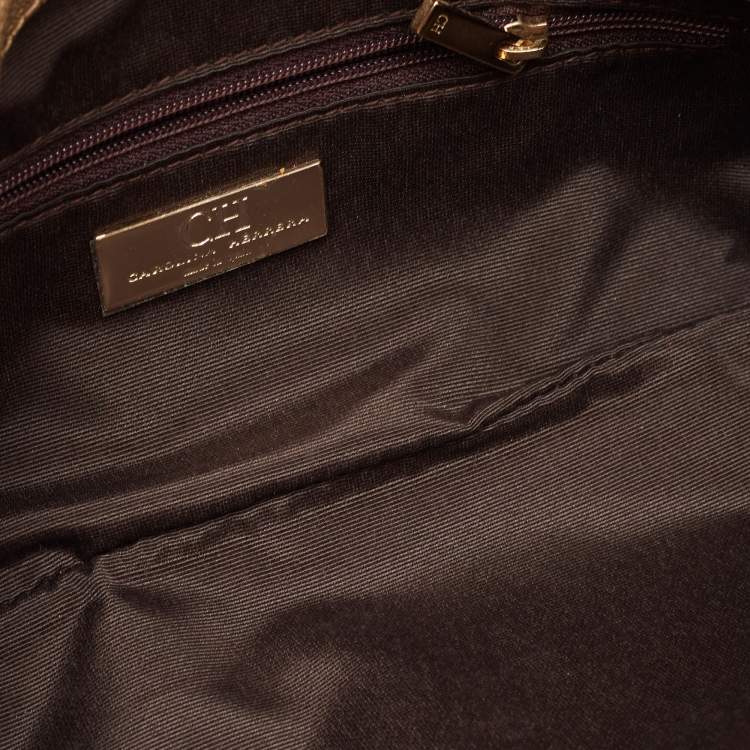 Pre Owned Carolina Herrera Gold Monogram Embossed Leather Bow Flap Clutch