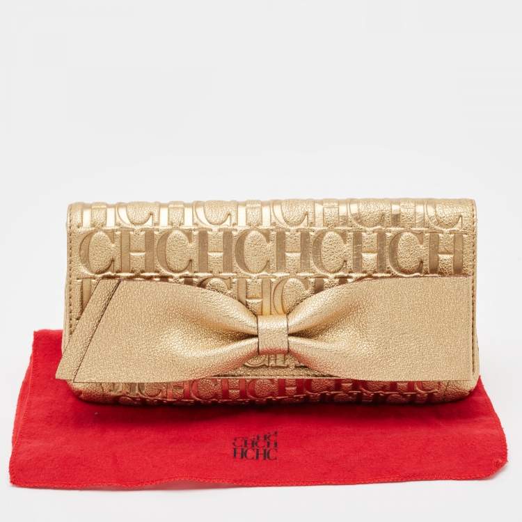 Pre Owned Carolina Herrera Gold Monogram Embossed Leather Bow Flap Clutch