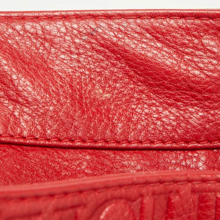 Pre Owned Carolina Herrera Red Monogram Embossed Leather Chain Bow Hobo