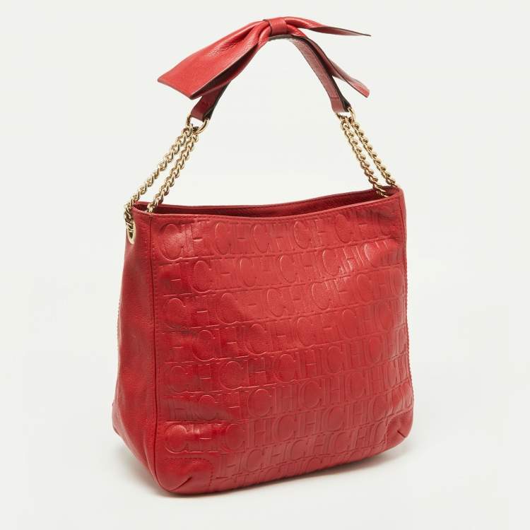Pre Owned Carolina Herrera Red Monogram Embossed Leather Chain Bow Hobo