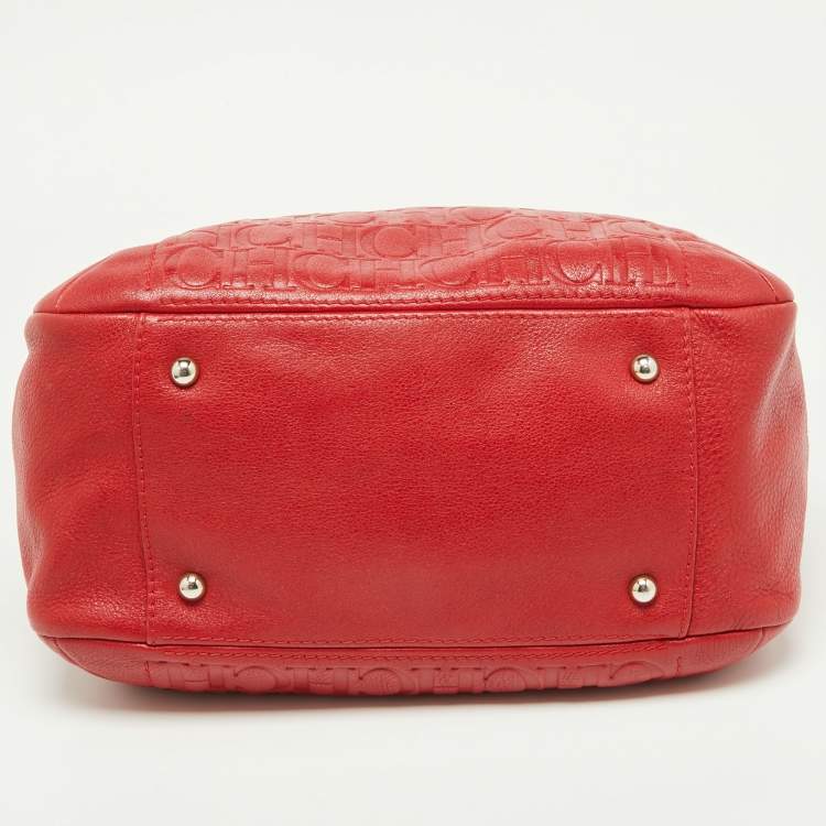 Pre Owned Carolina Herrera Red Monogram Embossed Leather Chain Bow Hobo