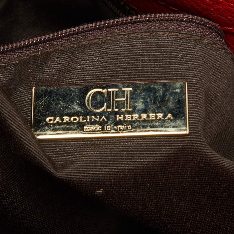 Pre Owned Carolina Herrera Red Monogram Embossed Leather Chain Bow Hobo