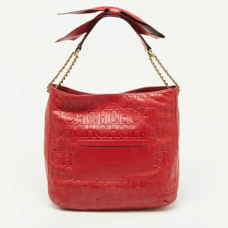 Pre Owned Carolina Herrera Red Monogram Embossed Leather Chain Bow Hobo
