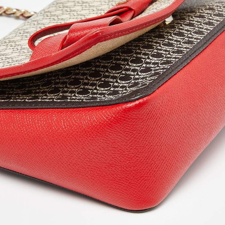 Pre Owned Carolina Herrera Red/White Monogram Coated Canvas and Leather Bow Flap Shoulder Bag