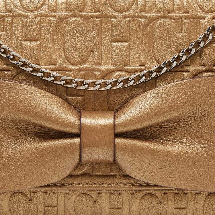 Pre Owned Caroline Herrera Gold Monogram Embossed Leather Bow Chain Clutch