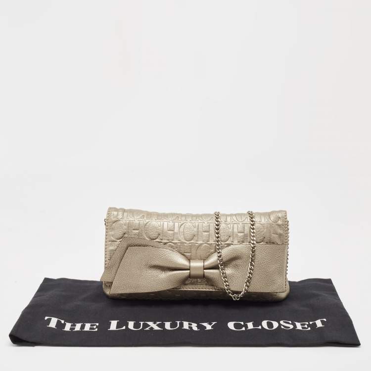 Pre Owned Carolina Herrera Grey Monogram Embossed Leather Bow Flap Chain Clutch  