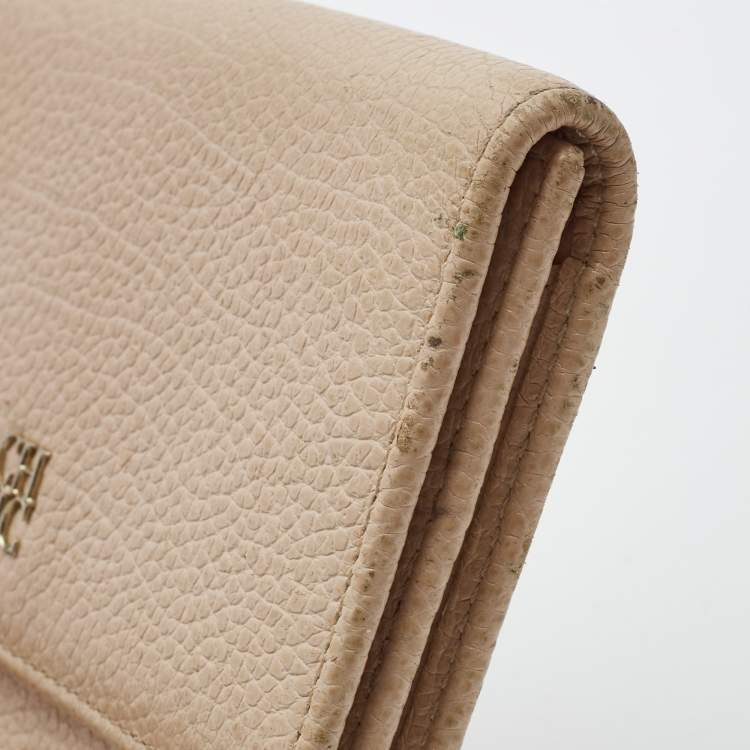 Pre Owned Carolina Herrera Peach Leather Logo Trifold Wallet
