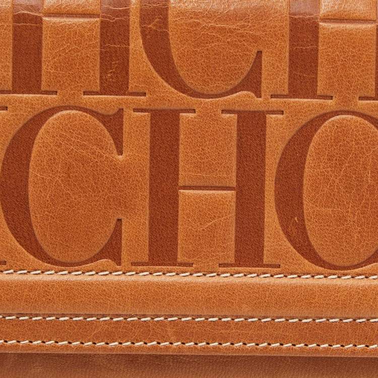 Pre Owned Carolina Herrera Brown Monogram Embossed Leather Trifold Continental Wallet
