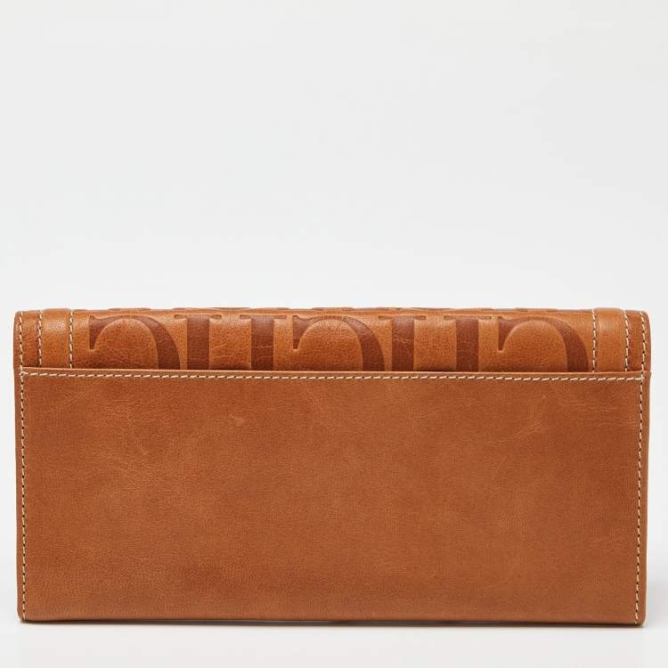 Pre Owned Carolina Herrera Brown Monogram Embossed Leather Trifold Continental Wallet