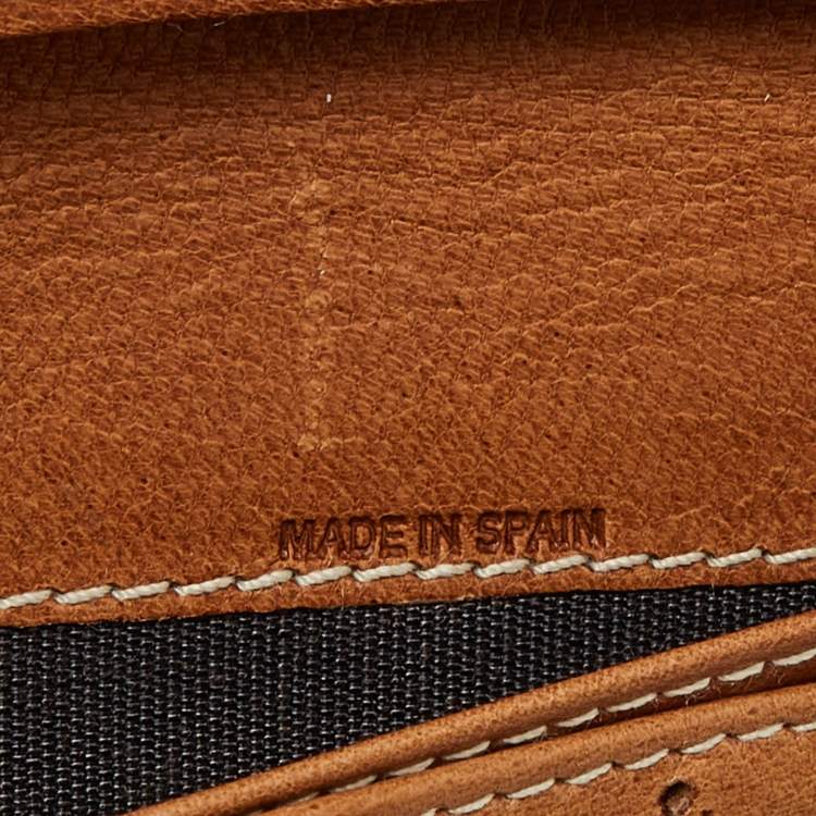 Pre Owned Carolina Herrera Brown Monogram Embossed Leather Trifold Continental Wallet