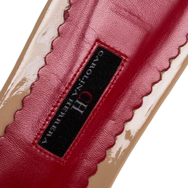 Pre Owned Carolina Herrera Beige CH Logo Embossed Patent Bow Detail Flat Slides Size 41